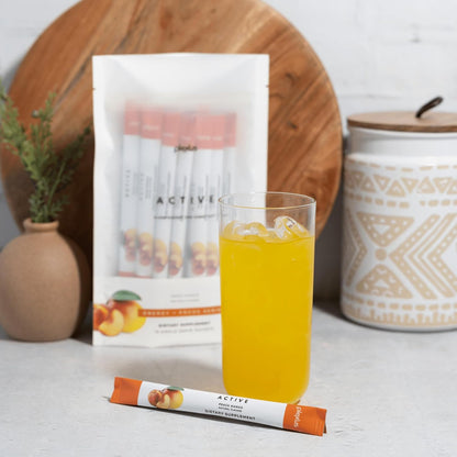 Plexus Active® Peach Mango | 100mg natural caffeine for clean energy and mental clarity. Supports nitric oxide production. 25 calories per serving